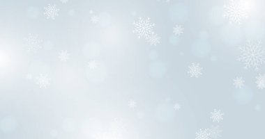 Falling snowflakes on soft blue background. Christmas and New year