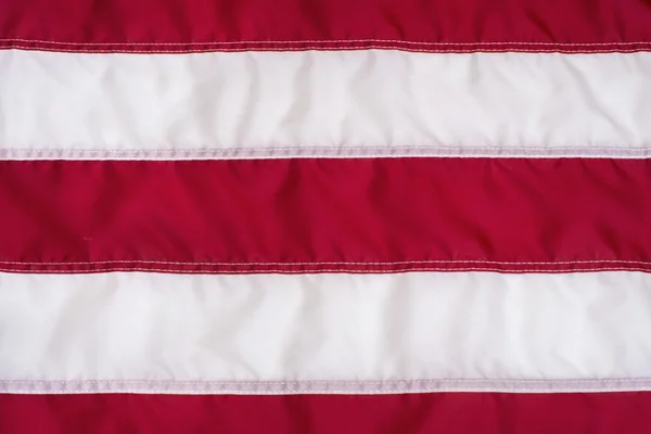 Rote und weiße Streifen auf amerikanischer Flagge — Stockfoto