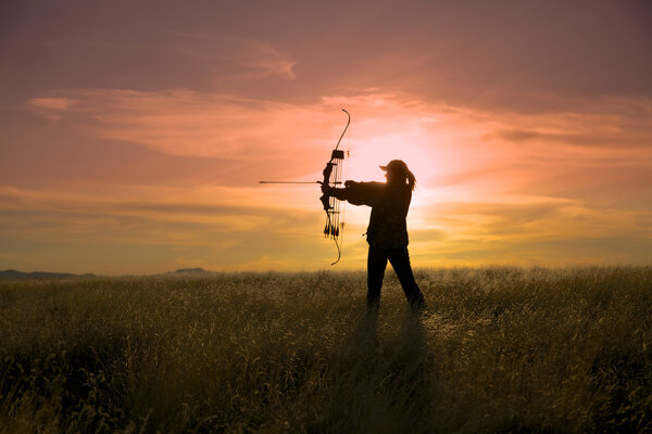 Bowhunter in Sunrise