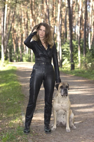 The slender girl with a dog — Stock Photo, Image