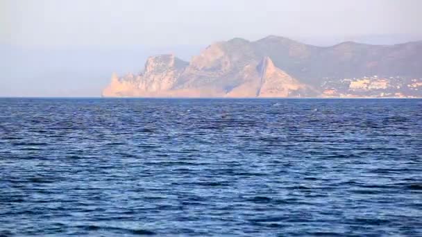 The sea with mountains on a distance shot. Landscape — Stock Video