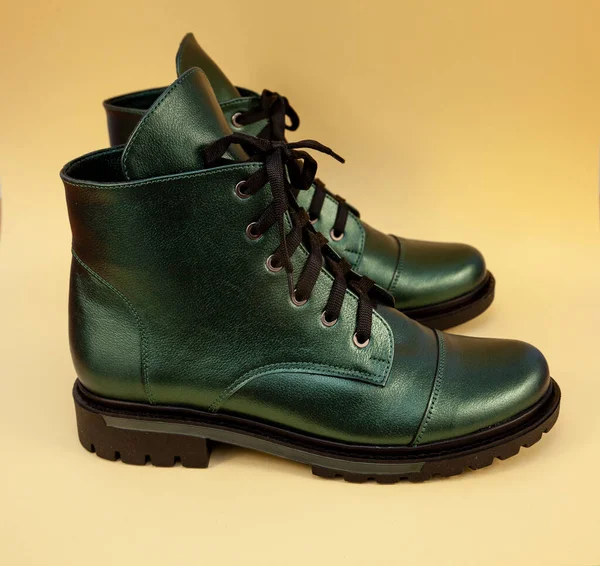 Green boots. Casual shoes classic. Leather modern boots. Boot with laces. Womens winter boot. Shoe.