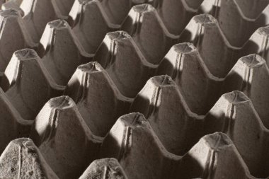 Soyut arkaplan. çerçeve geometrisi. Yumurta ambalajı. Evcil yumurtalar için kağıt tepsi. Bej ve gri. Minimalizm. Kağıt ambalaj yumurta kutusu.