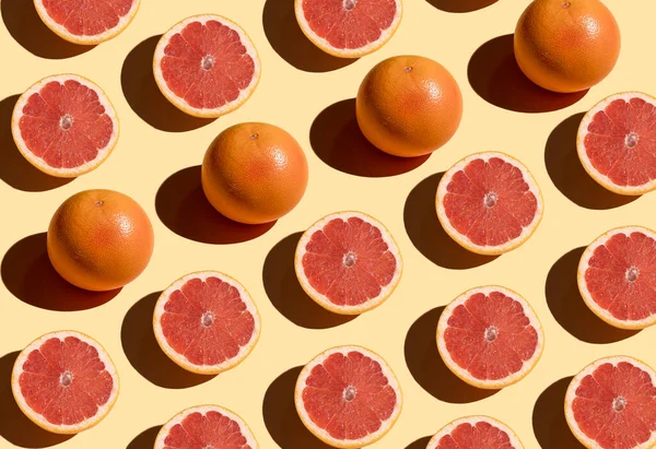 Grapefruit Pattern Beige Background Orange Juicy Grapefruit Cut Shadow Fruit — стоковое фото