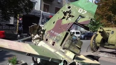 People on Khreshchatyk street. Ukrainians are watching Exhibition of destroyed burnt Russian military equipment. Ukrainian during the war. Russian tank. Summer. Ukraine, Kyiv - August 21, 2022.