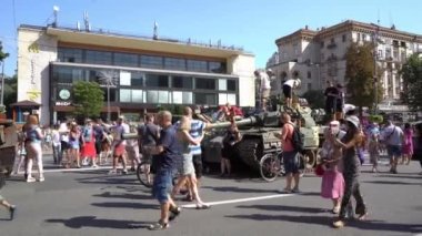 People on Khreshchatyk street. Ukrainians are watching Exhibition of destroyed burnt Russian military equipment. Ukrainian during the war. Russian tank. Summer. Ukraine, Kyiv - August 21, 2022.