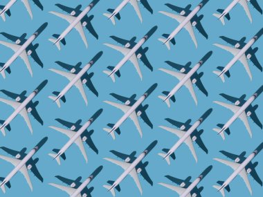 Uçak arka planı. Uçuşlar, seyahat ve havacılık. Mavi arka planda beyaz uçaklar var. Yolcu uçağı uçuyor. Hava taşımacılığı kavramı.