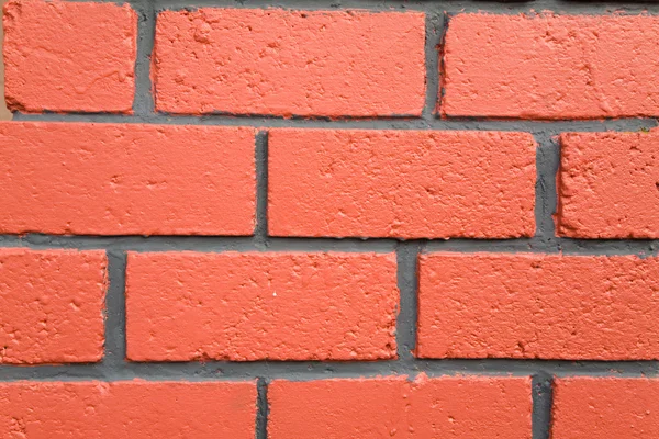 Стена из красного брика — стоковое фото