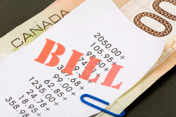 Bills and canadian dollars — Stok fotoğraf