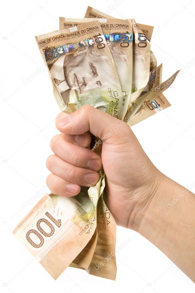 a hand full of canadian dollars