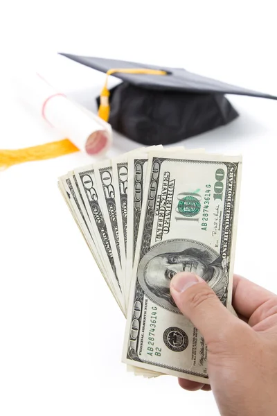 Svart mortarboard och dollar — Stockfoto