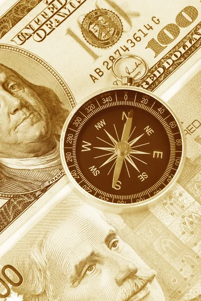 Compass and dollar — Stock Photo, Image