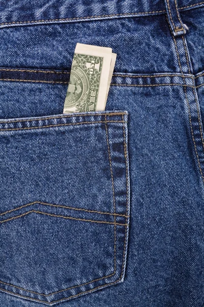 Blauwe jean en dollars — Stockfoto