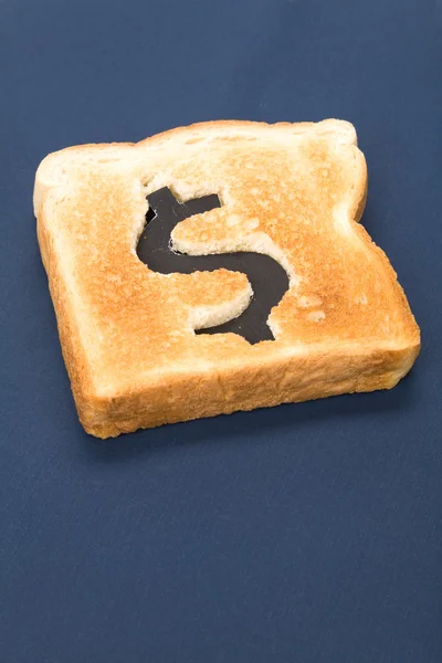 Sneetje brood met dollarteken — Stockfoto