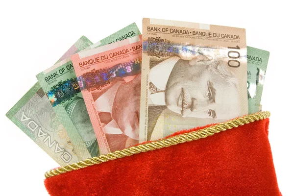 Christmas stocking en Canadese dollars — Stockfoto