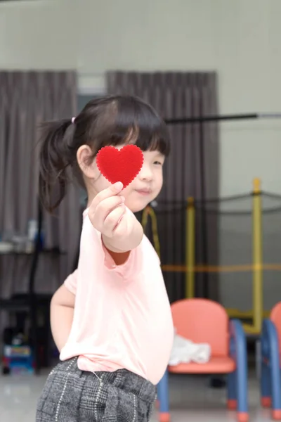 Portrait Asian Little Baby Girl Giving Red Heart Sign You — Stockfoto