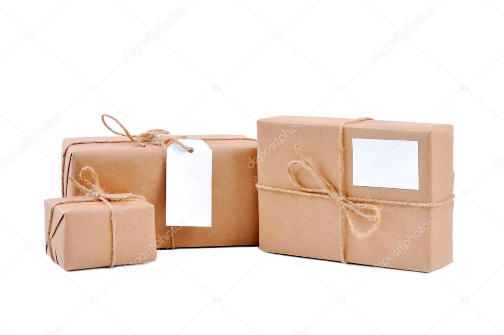 Three brown packages with blank labels