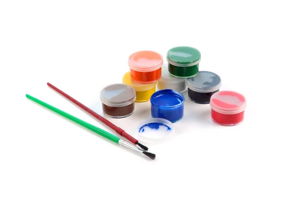 Lådor med färger och penslar — Stockfoto