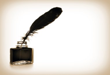 Tüy ve mürekkep şişesi.