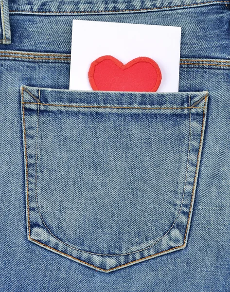 Bolso traseiro de calça jeans com cartão — Fotografia de Stock