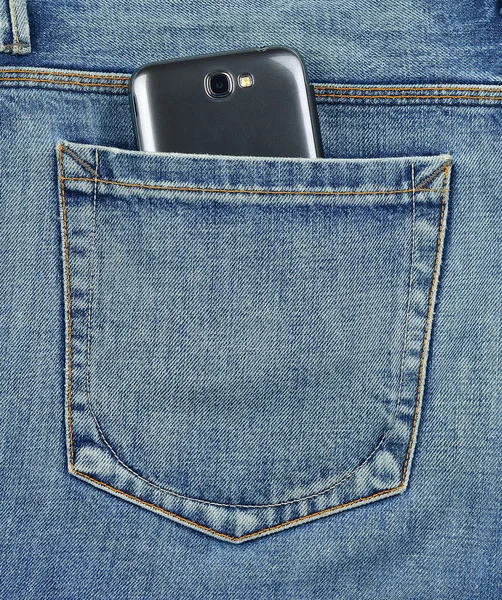 Bolso traseiro de jeans telefone celular — Fotografia de Stock