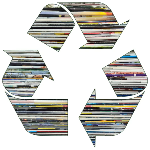 Símbolo de reciclagem com revistas antigas — Fotografia de Stock