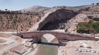 Aerial view of Severan Bridge and Chabinas creek at Adiyaman province, southeastern Anatolia, Turkey. Cendere bridge or Chabinas bridge is a late Roman bridge located near the ancient city of Arsameia