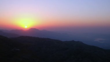 Sun above mountain range. Scenic view of sunrise in a mountainside. Nemrut Dagi National Park, Adiyaman province, Turkiye