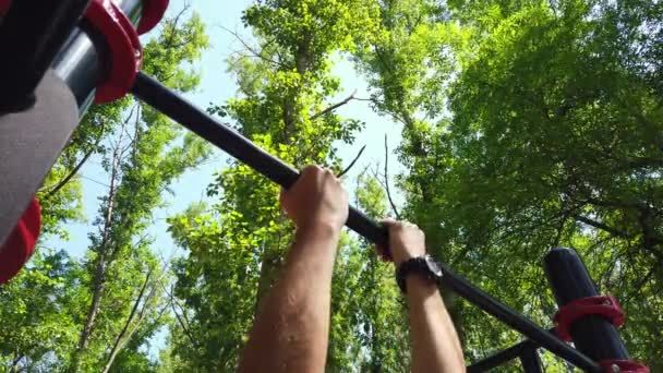 Low Angle View Man Pulling Himself Crossbar Outdoor Workout Ground — Vídeo de stock