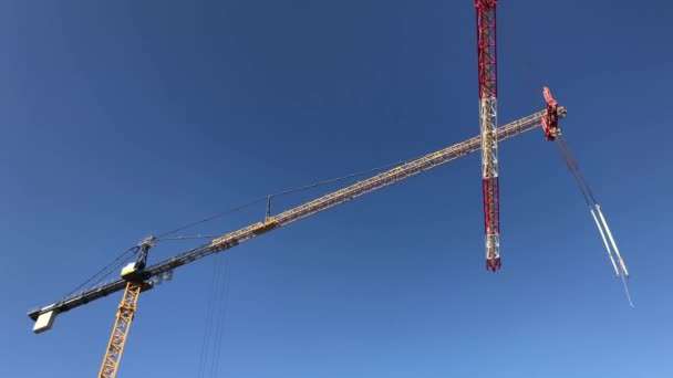 Low Angle View Tower Crane Working Construction Site — Video