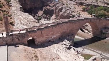 Aerial view of Severan Bridge and Chabinas creek at Adiyaman province, southeastern Anatolia, Turkey. Cendere bridge or Chabinas bridge is a late Roman bridge located near the ancient city of Arsameia