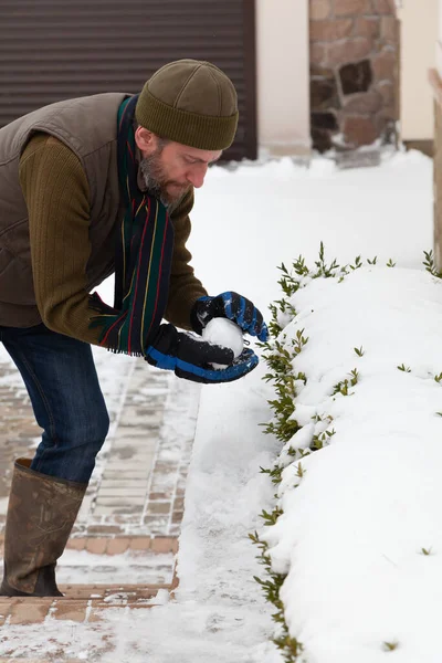 Winter Fun Man Beard Warm Vest Hat Forms Snowballs Yard — Stock Photo, Image