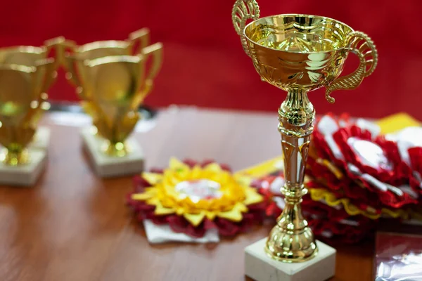 Award Products Table Right Tall Golden Goblet Background Yellow Red — Stock Photo, Image