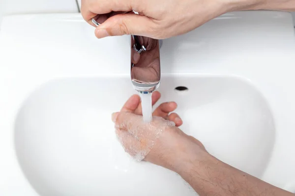 Right Hand Opens Tap Lever Faucet White Tiled Sink Jet — Fotografia de Stock