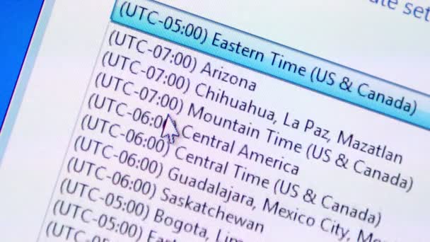 Selecting time zone on a computer — Stock Video