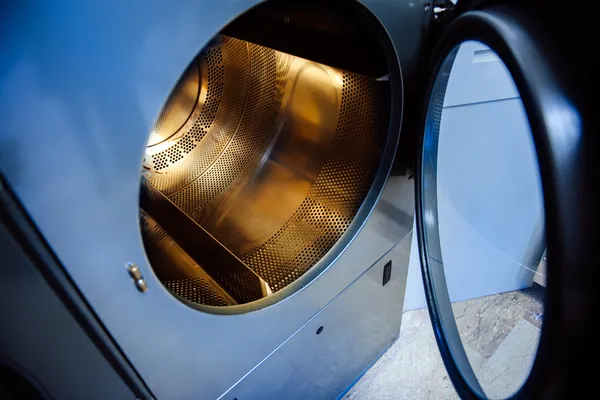 Washing machine with gold plated drum — Stock Photo, Image