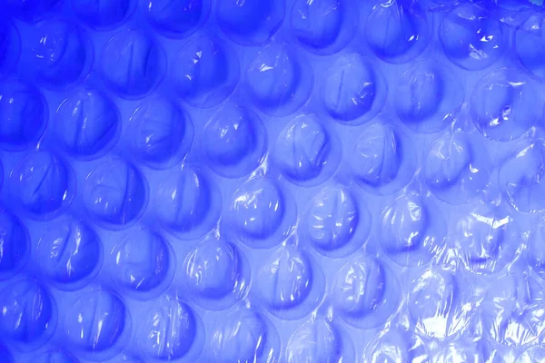 Material plástico de envoltura de burbuja azul: suministros de embalaje para diversos hogares — Foto de Stock