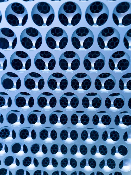 Close-up of air ducts ventilation holes on front aluminum body of Apple Computers Mac pro — Stock Photo, Image