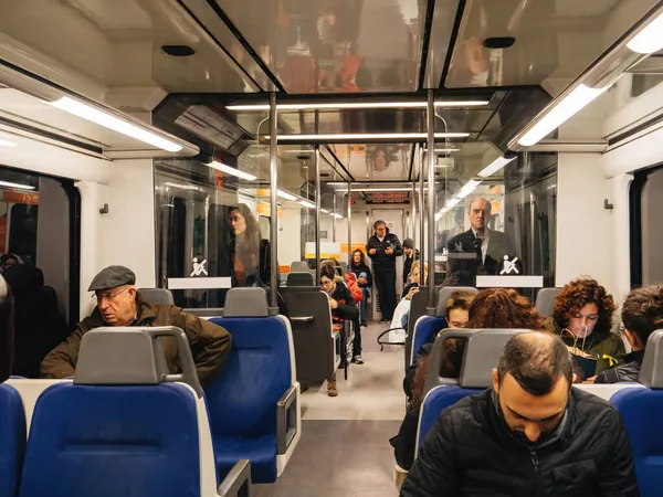 People commuting inside Barcelona train metro train — Stock Photo, Image
