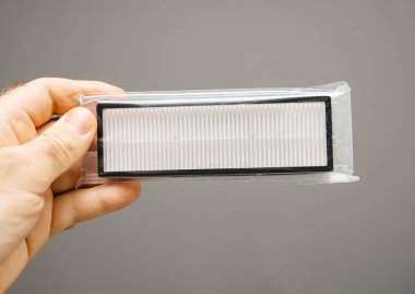 Elinde küçük Hepa Fipter köknar Yeni robot elektrikli süpürge