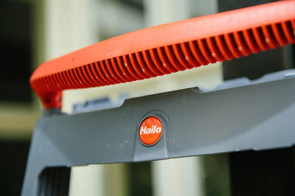 Close-up of new ladder with red Hailo manufacturer logotype - made in Germany — Stok fotoğraf