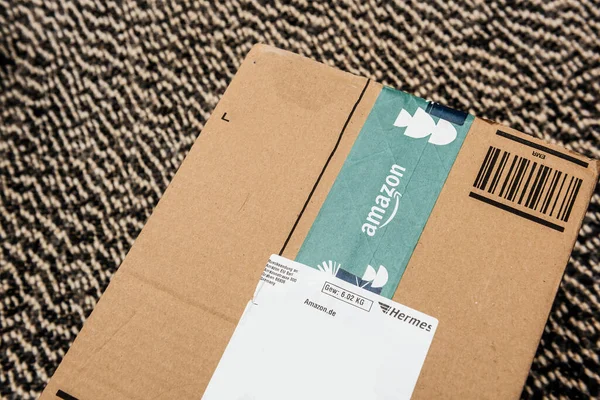 Amazon Prime cardboard box with Christmas winter holidays scotch — стокове фото