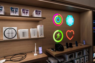 Diverse IoT smart accessories shopping inside the Apple Store Ch