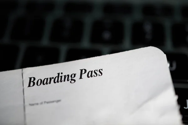 Extreme close-up of Boarding pass with close-up macro text — Stockfoto