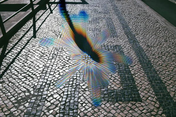 Shadow of human silhouette on the Av. da Liberdade in central Li — Stock Photo, Image