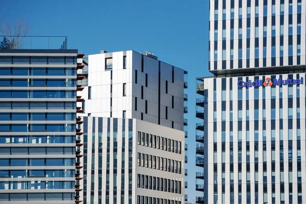 Credit Mutuel signage logotype on the tall skyscraper in the business district — Stock Photo, Image