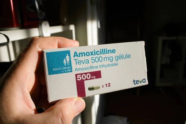 Paris France May 2022 Pov Male Hand Holding Package Amoxicilline — стоковое фото