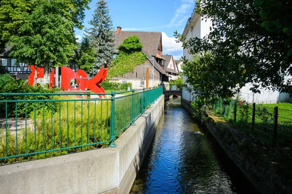 Oberkirch german city with beautiful water canal and kids playground area on the left