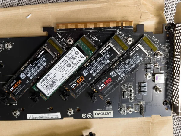 Paris, France - Aug 4, 2022: Close-up of multiple NVME on the Lenovo thinkstation PCIe Add-In-Card with new Samsung 980 Pro NVME sss hard disk drive , 970 evo and 970 evo plus and one SK Hynix