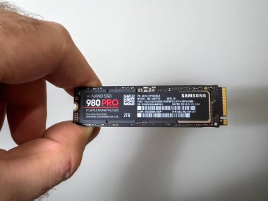 Paris, France - aUG 8, 2022: POV male hand unboxing unpacking new Samsung 980 Pro NVME ss hard disk drive for the personal computer or mac Apple upgrade